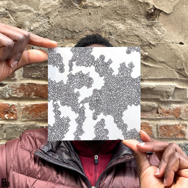 Photo of a human holding this specific LLLinked square. The lines of LLLinked are drawn by hand. Each square is 6"x6", cut, labeled, signed, and stamped by hand. Each LLLinked square has a unique QR code/RFID label. No two squares are the same. Owners can register and connect with other owners at LLLinked.art.